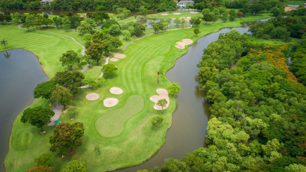 Beginner enjoying golf practice on a quality course